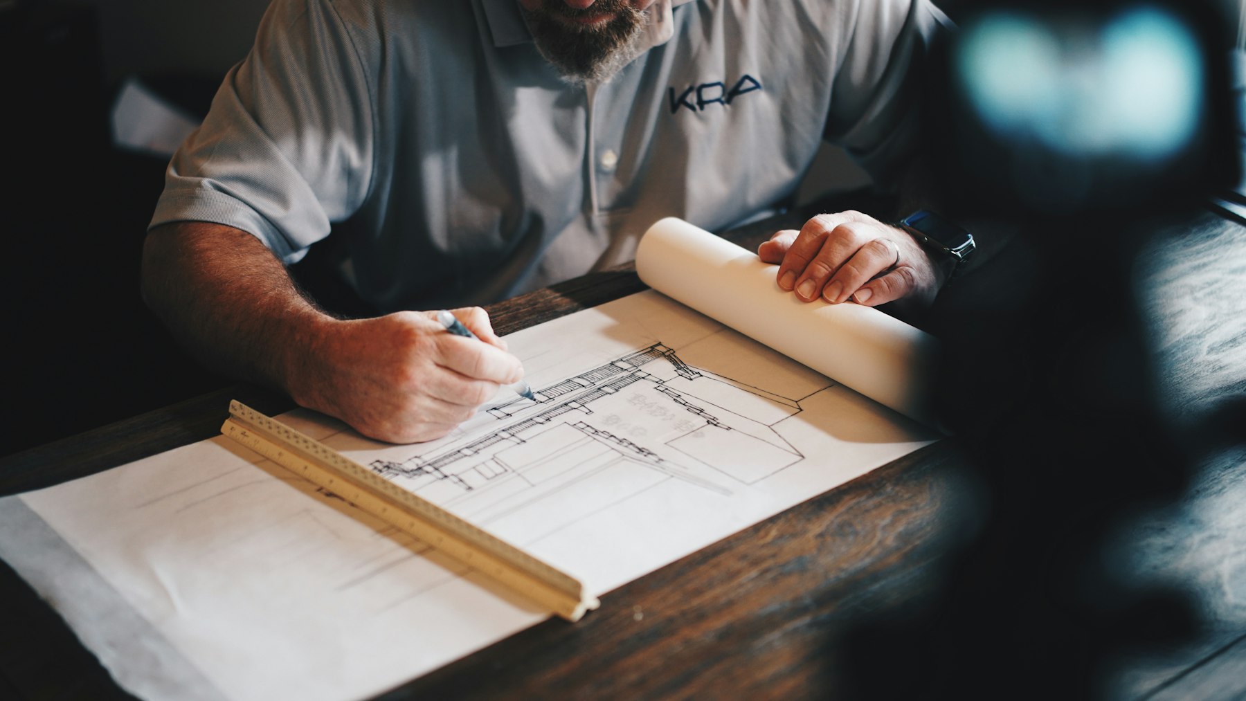 Development plans being reviewed at a desk